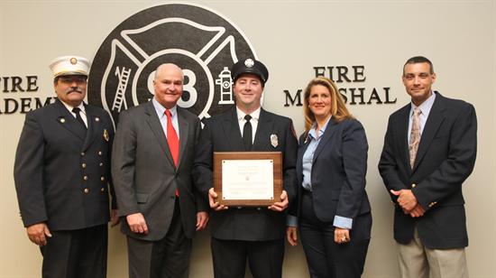 The Ronald Fitzpatricks Firefighter 1 Award was presented to Vincent R. Janovsky, Class 98 of the East Brunswick Fire District 1, in recognition of his high test scores. Pictured from left to right: Fire Marshal Henry Styker III, Freeholder John P. Curley, Vincent R. Janovsky, Freeholder Deputy Director Serena DiMaso and Fire Academy Director Armand Guzzi.